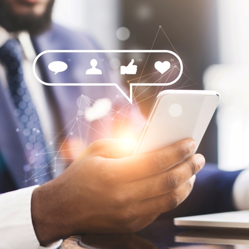 Stock image - man using social media